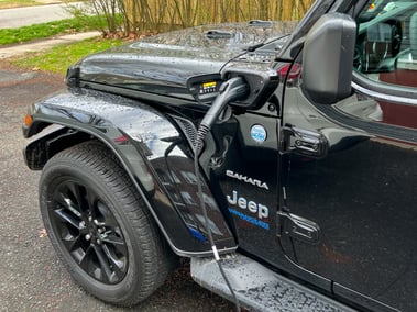 jeep wrangler EV plugged in and charging
