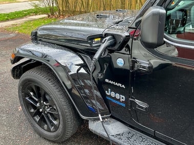 jeep wrangler EV plugged in and charging