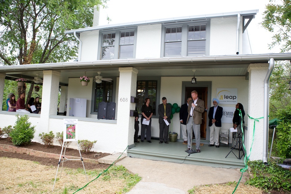 Ribbon cutting for opening of ecoREMOD house in Charlottesville, the educational signage and outreach materials for which were developed by UVa students
