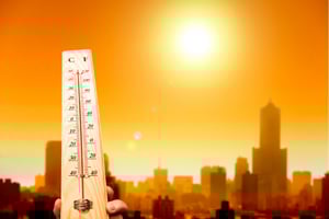 heatwave-in-the-city-and-hand-showing-thermometer-000025572542_Large