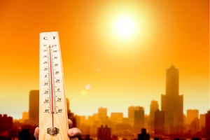 heatwave-in-the-city-and-hand-showing-thermometer-000025572542_Large